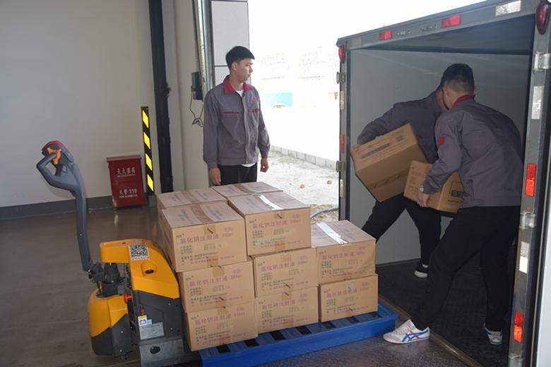 Chinese supplier shipments arriving at Guangzhou warehouse by truck