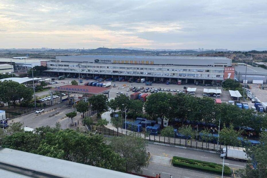 Aerial view of Guangzhou Baiyun Airport cargo terminal and Nansha Port representing Guangzhou logistics infrastructure